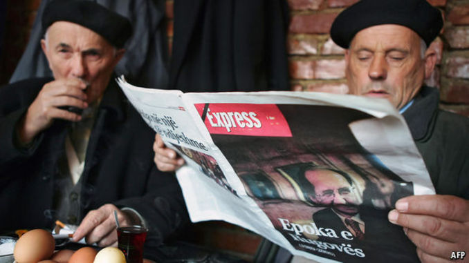 Old Men Read Newspapers in Kosovo
